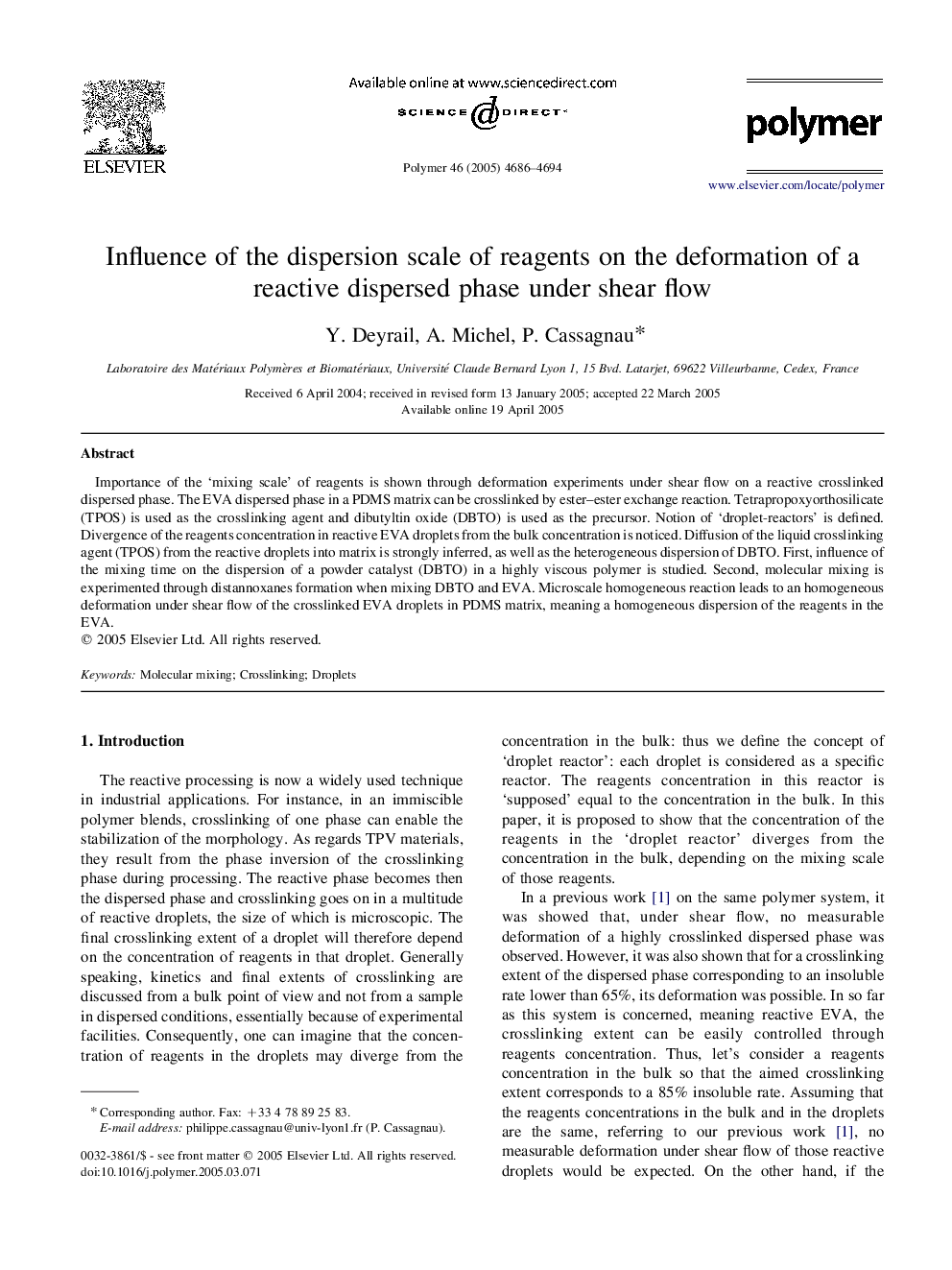 Influence of the dispersion scale of reagents on the deformation of a reactive dispersed phase under shear flow