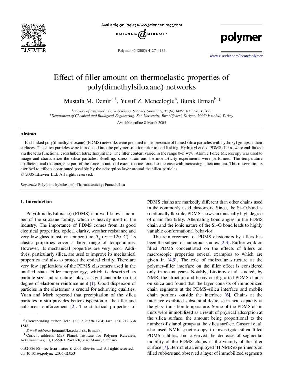 Effect of filler amount on thermoelastic properties of poly(dimethylsiloxane) networks