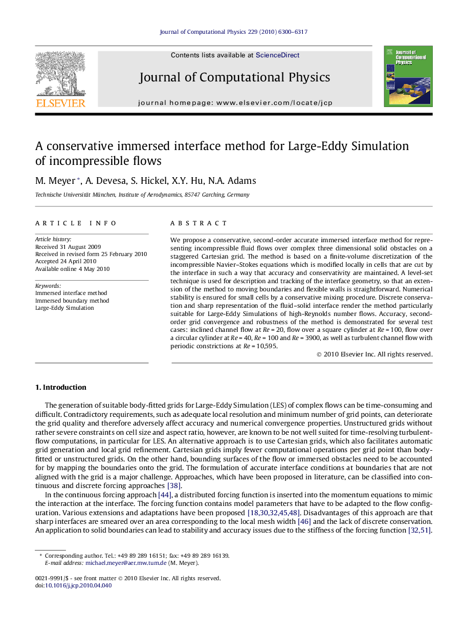 A conservative immersed interface method for Large-Eddy Simulation of incompressible flows