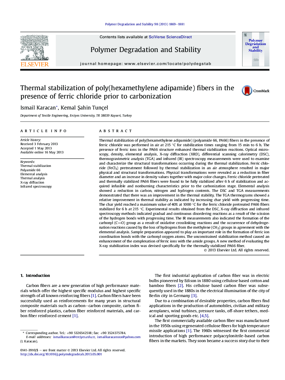 Thermal stabilization of poly(hexamethylene adipamide) fibers in the presence of ferric chloride prior to carbonization