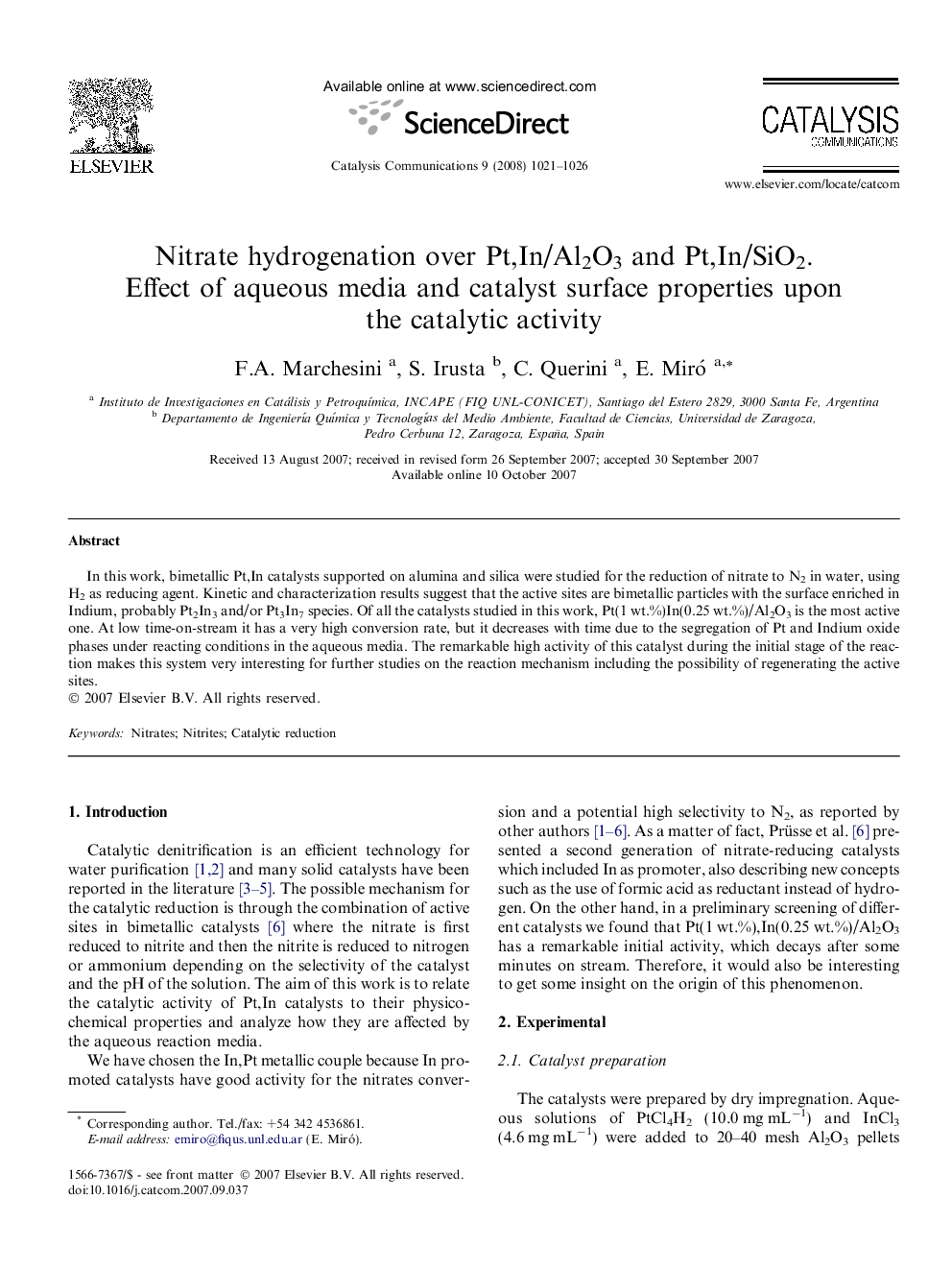 Nitrate hydrogenation over Pt,In/Al2O3 and Pt,In/SiO2. Effect of aqueous media and catalyst surface properties upon the catalytic activity