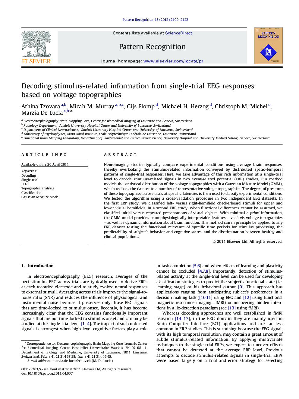 Decoding stimulus-related information from single-trial EEG responses based on voltage topographies