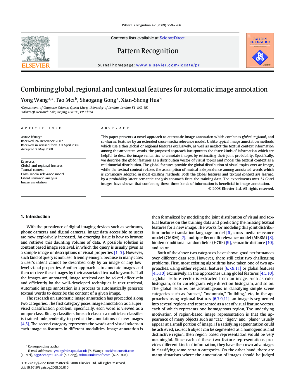 Combining global, regional and contextual features for automatic image annotation