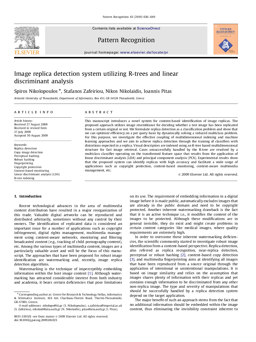 Image replica detection system utilizing R-trees and linear discriminant analysis