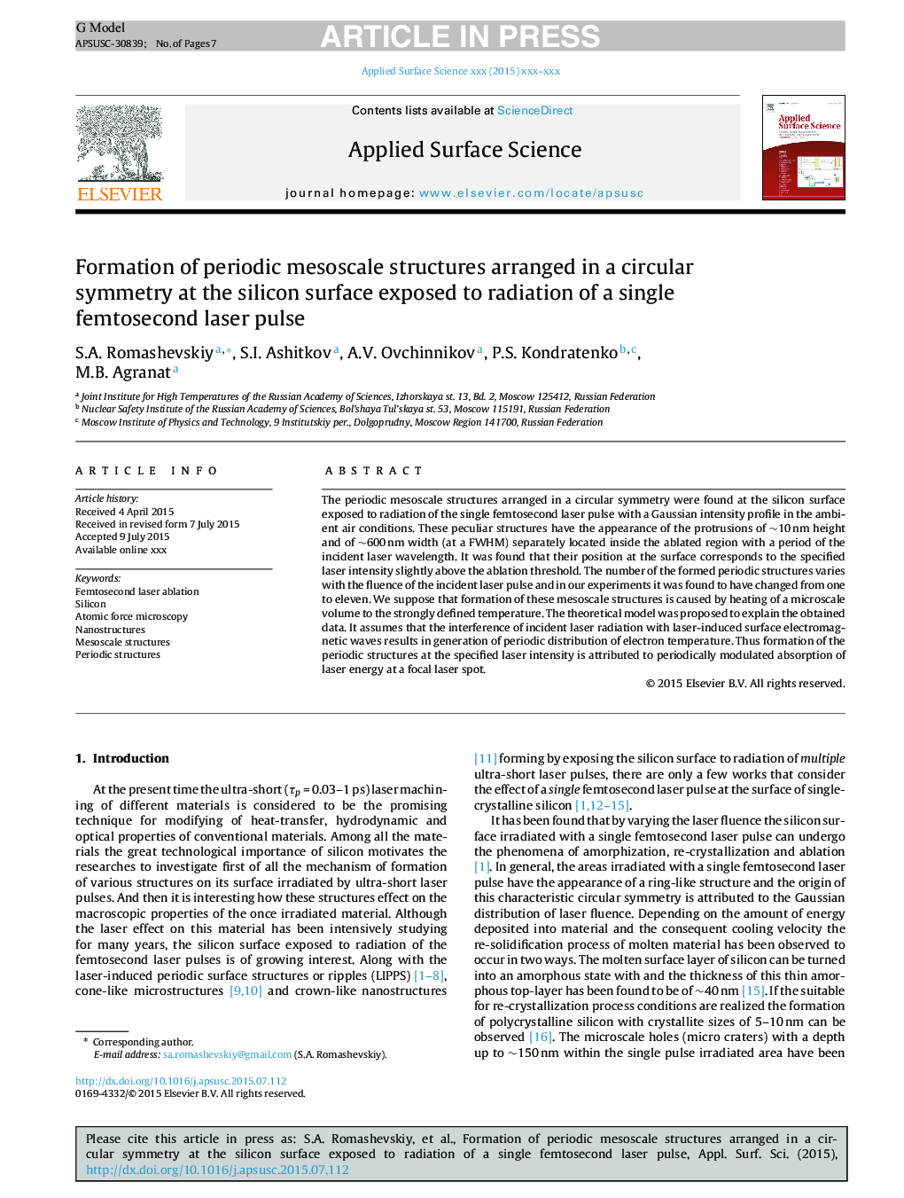 Formation of periodic mesoscale structures arranged in a circular symmetry at the silicon surface exposed to radiation of a single femtosecond laser pulse