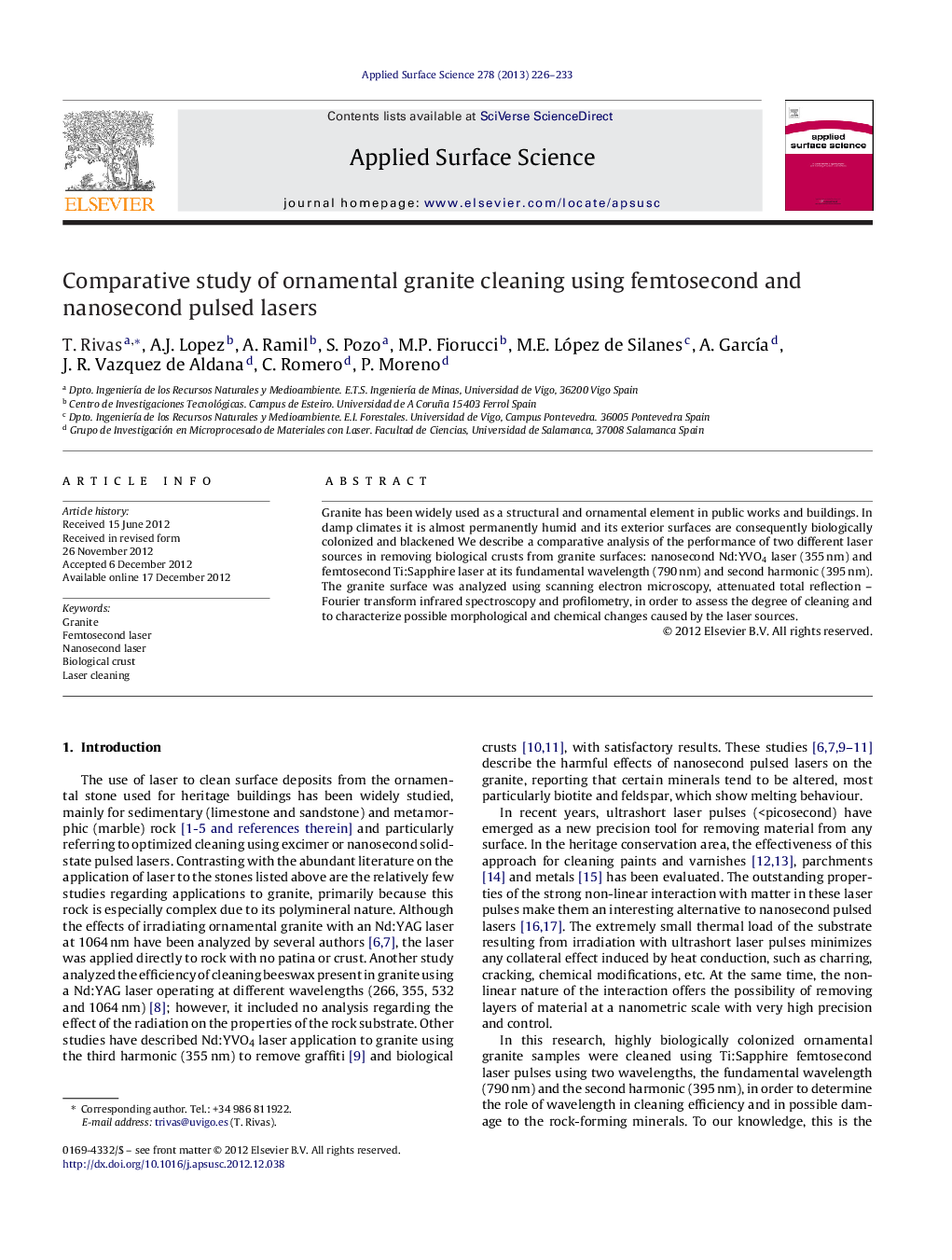 Comparative study of ornamental granite cleaning using femtosecond and nanosecond pulsed lasers