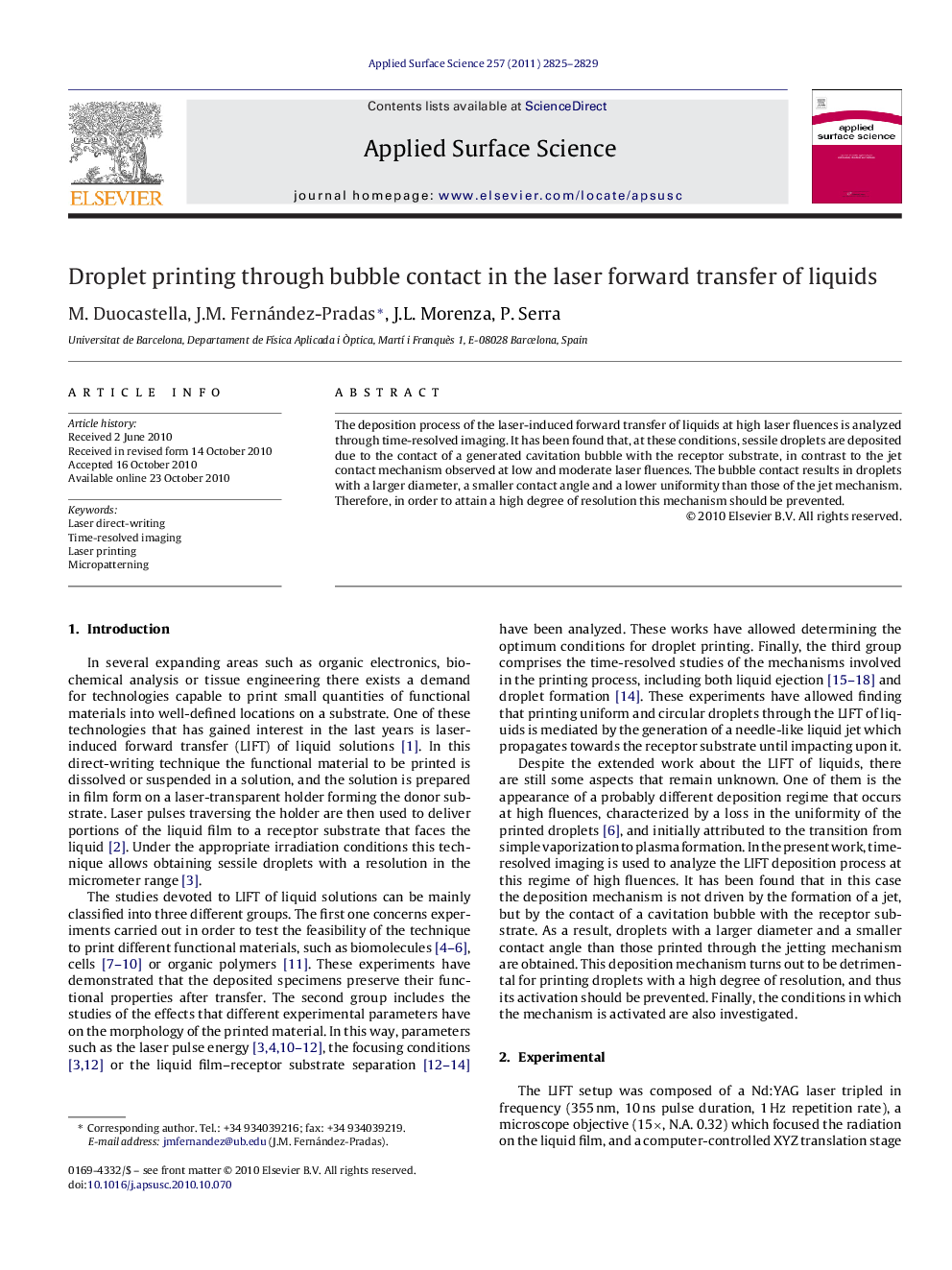 Droplet printing through bubble contact in the laser forward transfer of liquids