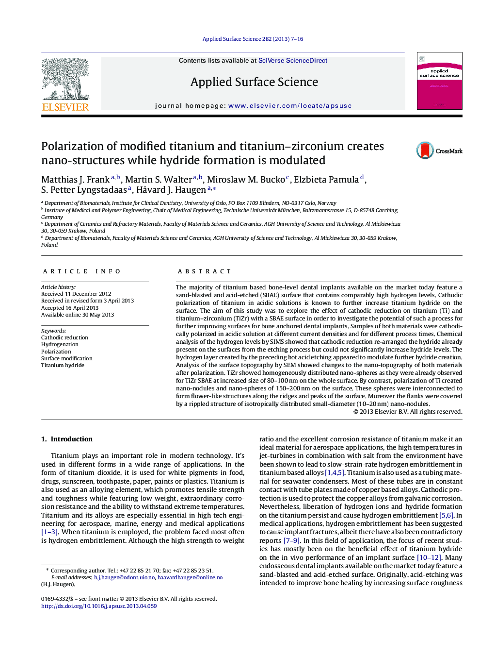 Polarization of modified titanium and titanium-zirconium creates nano-structures while hydride formation is modulated