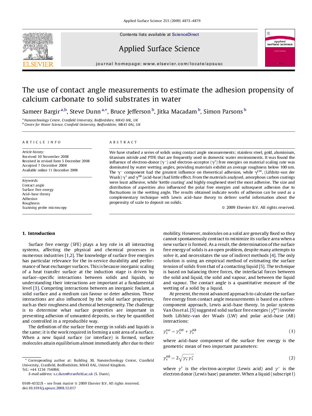 The use of contact angle measurements to estimate the adhesion propensity of calcium carbonate to solid substrates in water