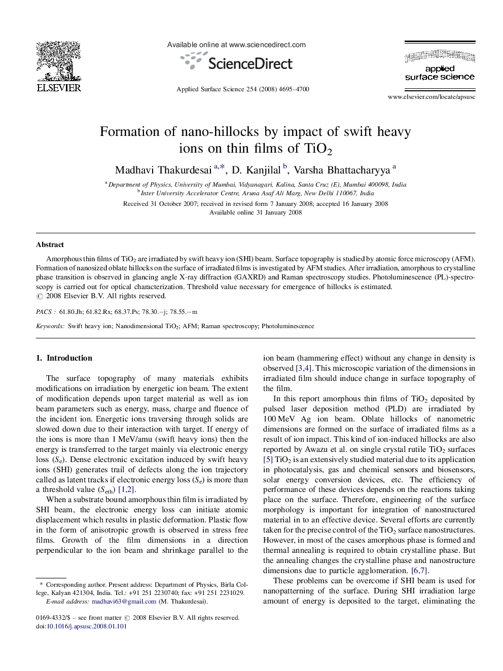 Formation of nano-hillocks by impact of swift heavy ions on thin films of TiO2