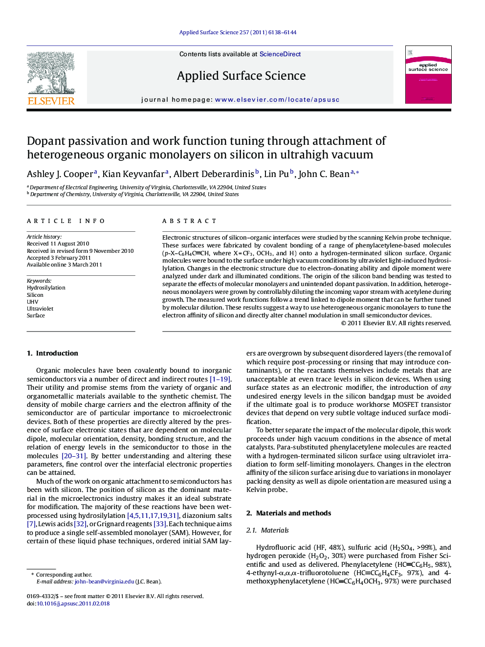 Dopant passivation and work function tuning through attachment of heterogeneous organic monolayers on silicon in ultrahigh vacuum