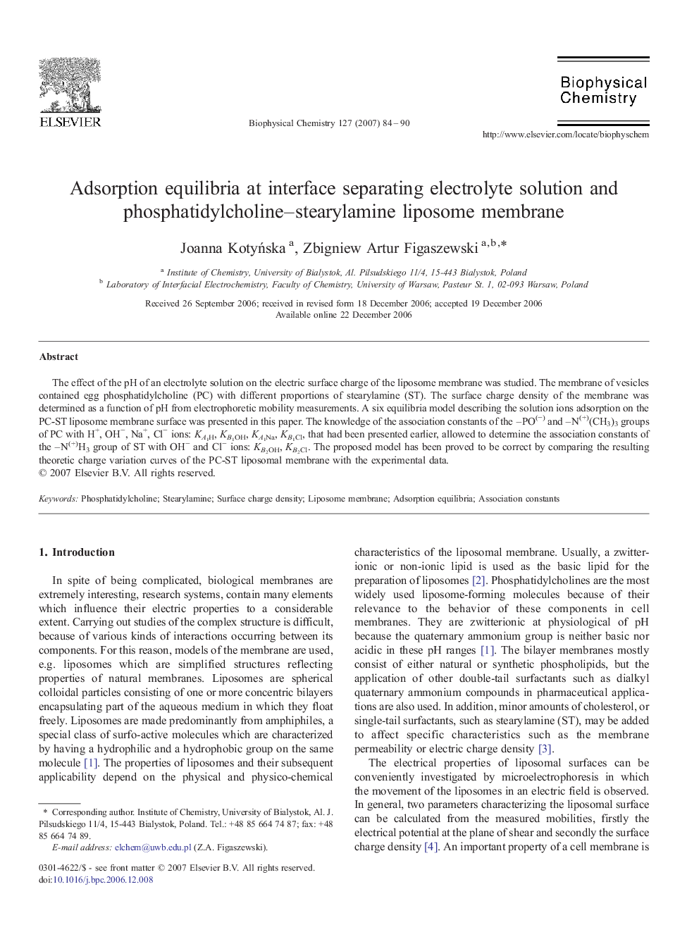 Adsorption equilibria at interface separating electrolyte solution and phosphatidylcholine-stearylamine liposome membrane