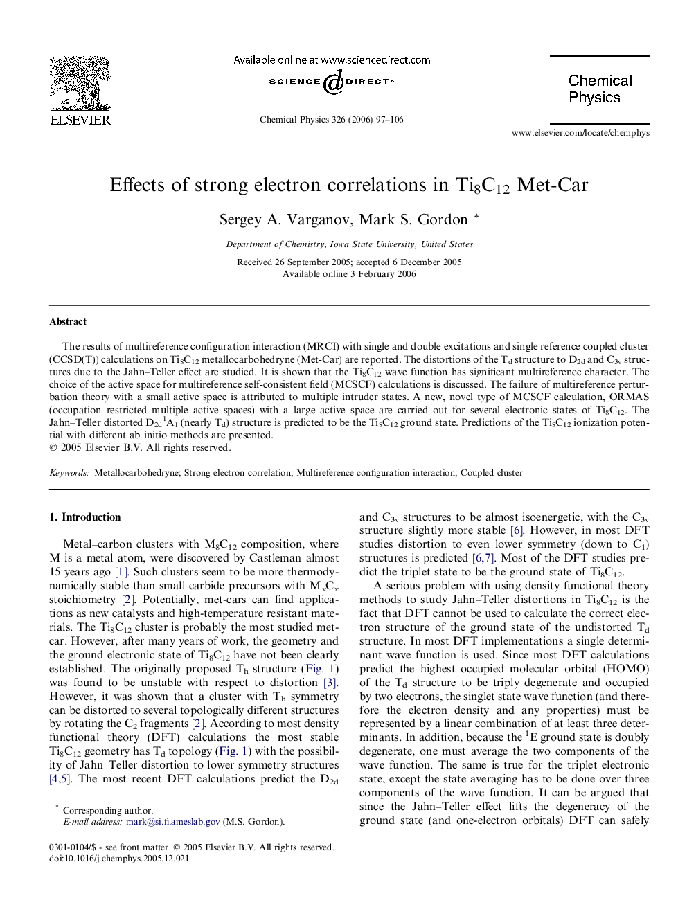 Effects of strong electron correlations in Ti8C12 Met-Car