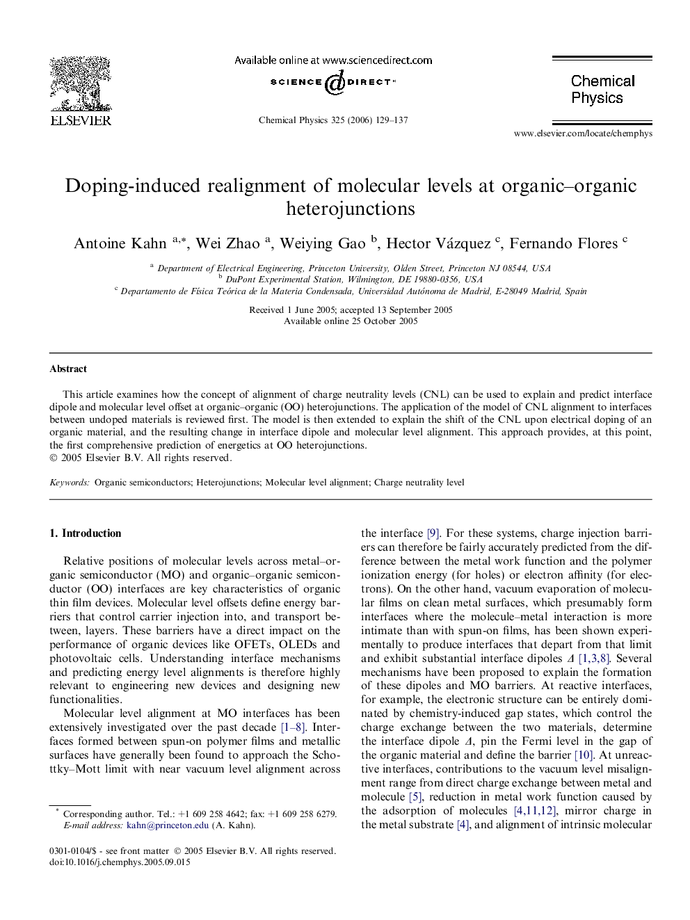 Doping-induced realignment of molecular levels at organic-organic heterojunctions