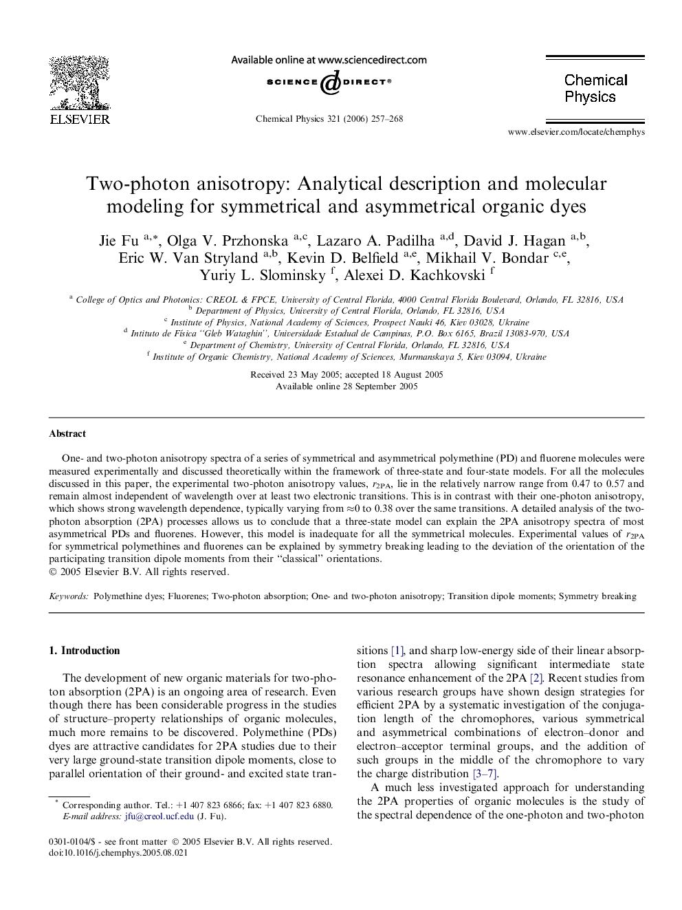 Two-photon anisotropy: Analytical description and molecular modeling for symmetrical and asymmetrical organic dyes