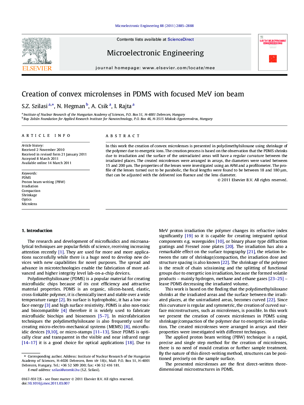 Creation of convex microlenses in PDMS with focused MeV ion beam