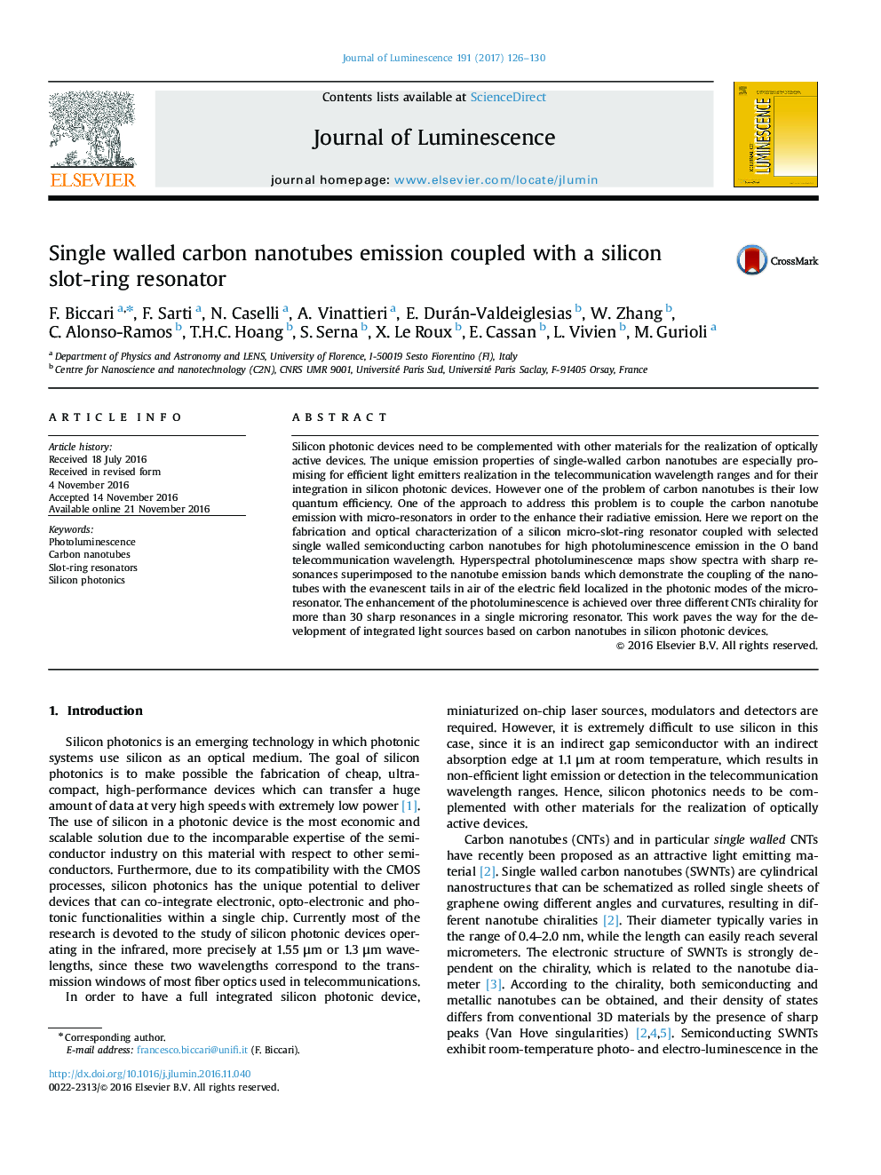 Single walled carbon nanotubes emission coupled with a silicon slot-ring resonator