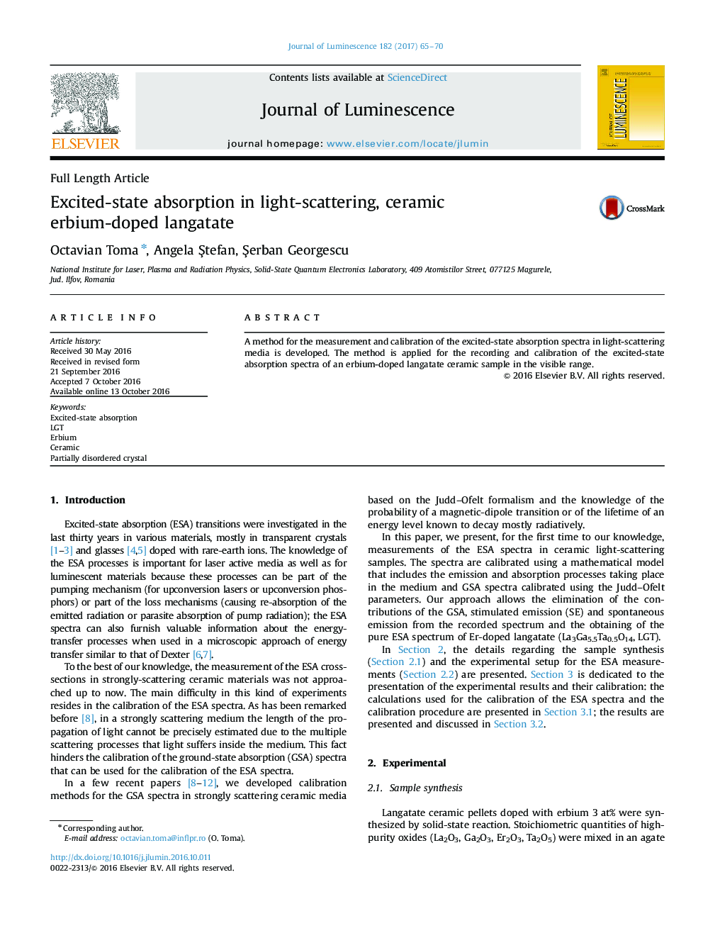 Excited-state absorption in light-scattering, ceramic erbium-doped langatate