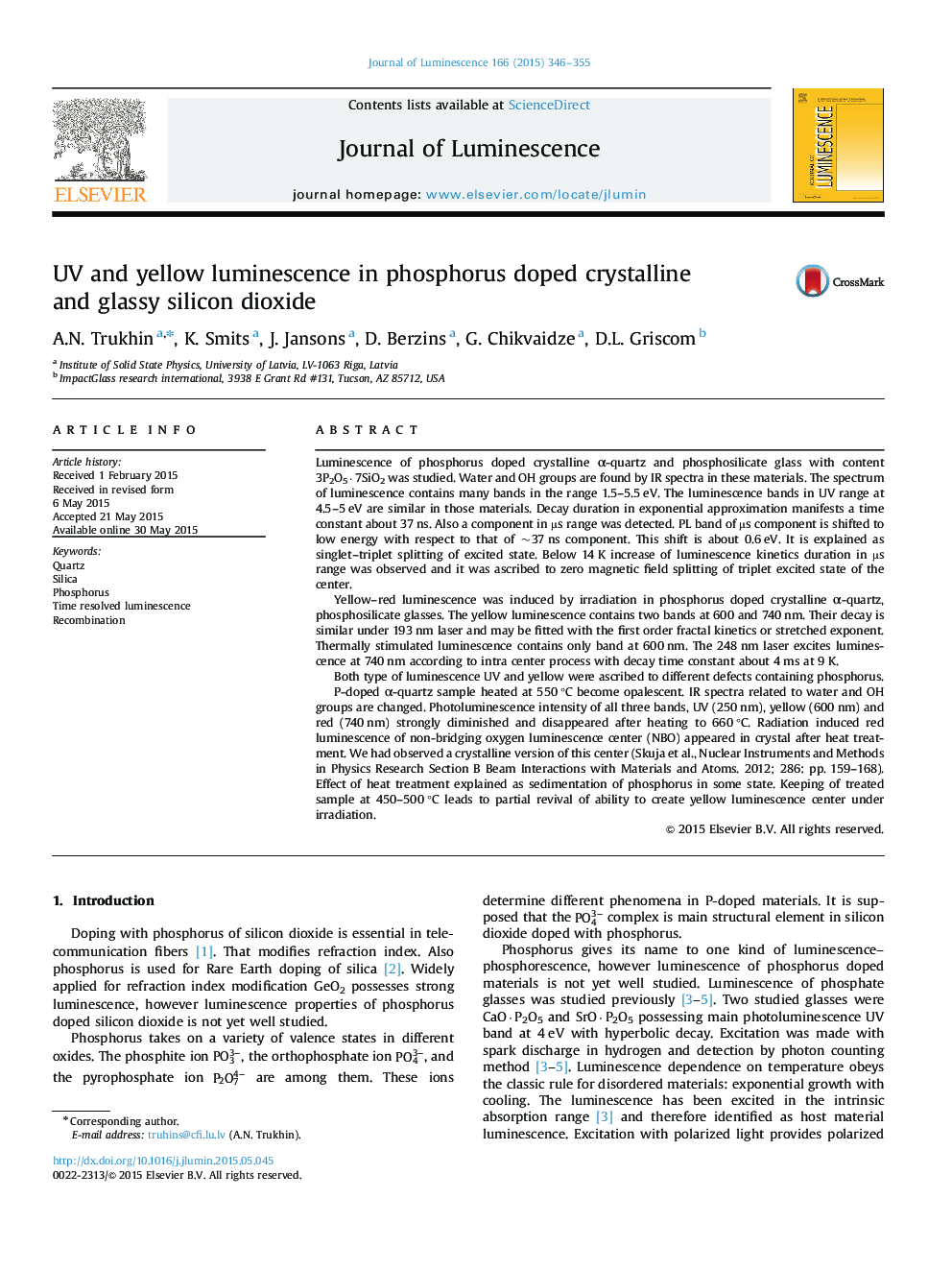 UV and yellow luminescence in phosphorus doped crystalline and glassy silicon dioxide