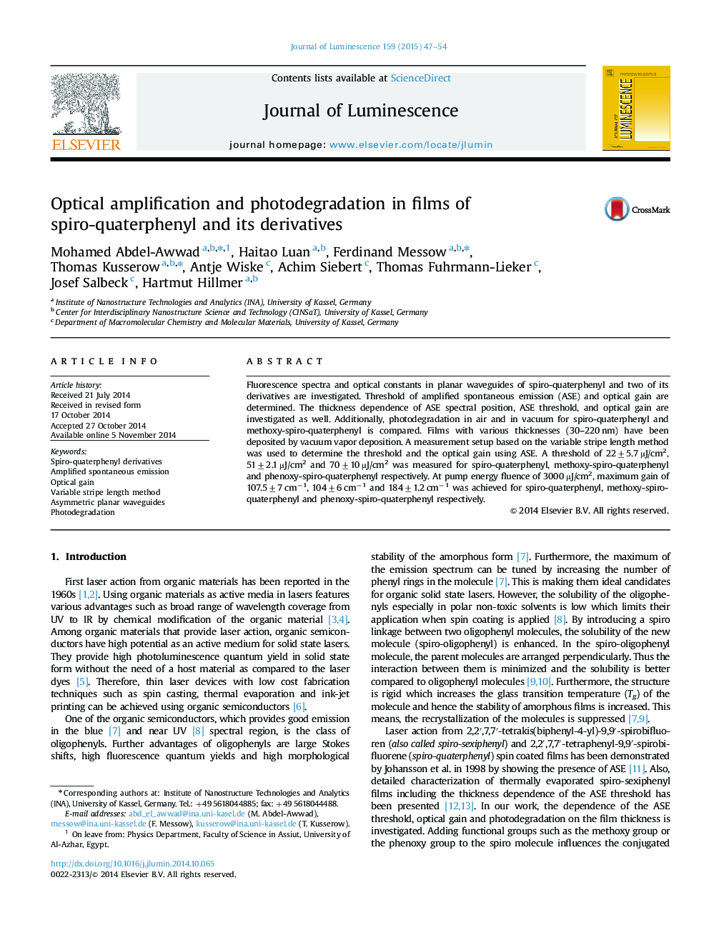 Optical amplification and photodegradation in films of spiro-quaterphenyl and its derivatives