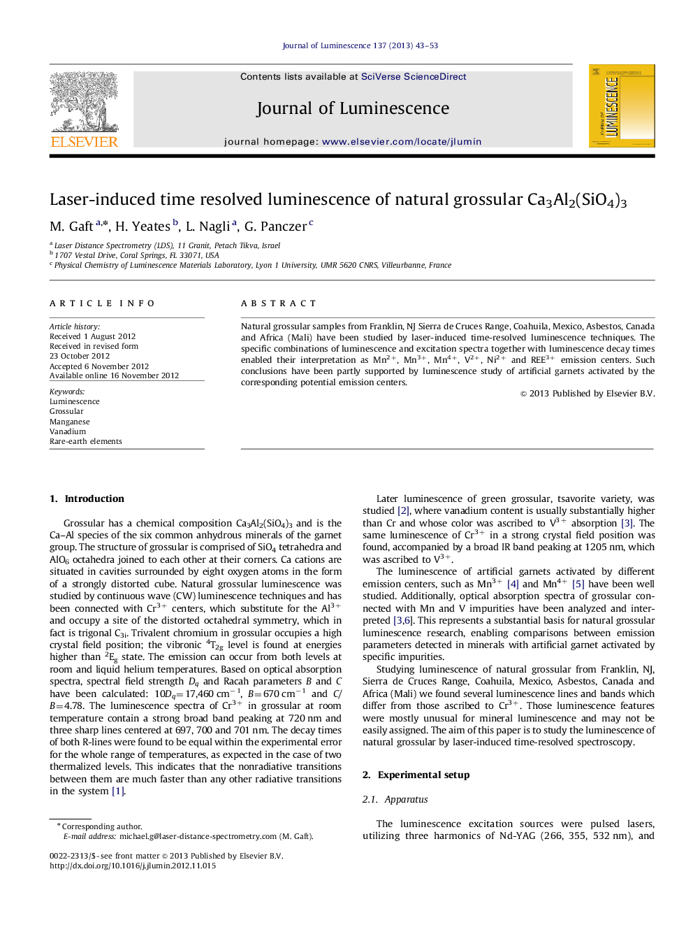 Laser-induced time resolved luminescence of natural grossular Ca3Al2(SiO4)3