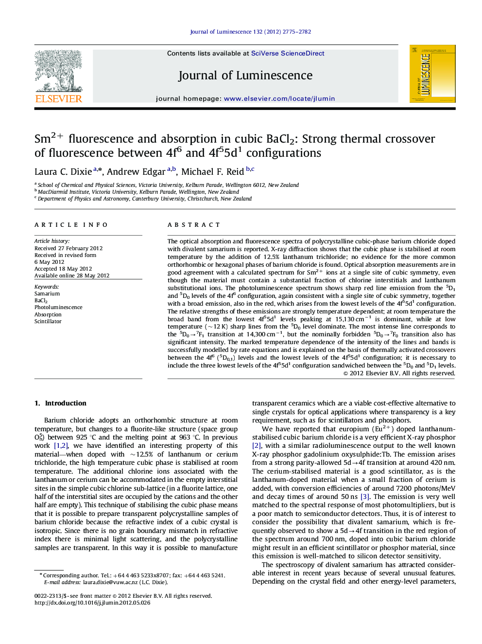 Sm2+ fluorescence and absorption in cubic BaCl2: Strong thermal crossover of fluorescence between 4f6 and 4f55d1 configurations