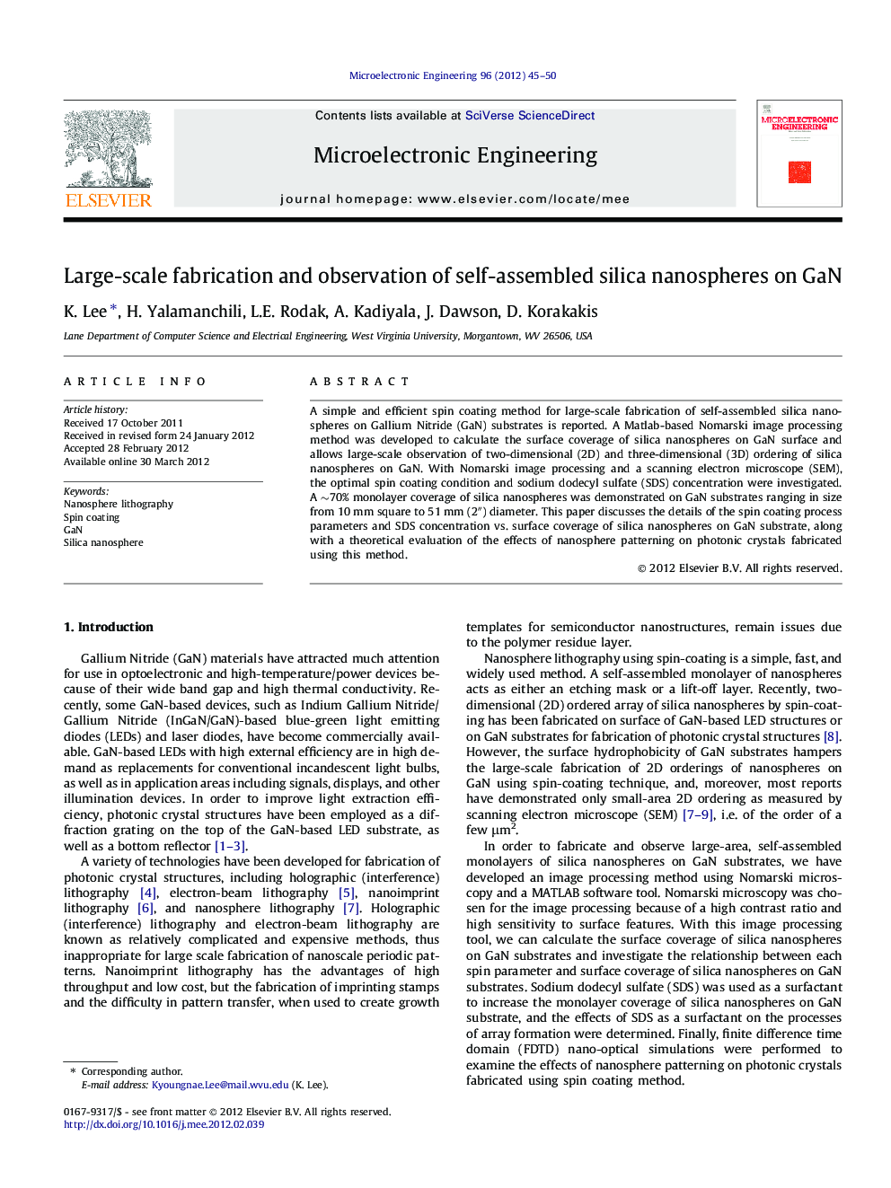 Large-scale fabrication and observation of self-assembled silica nanospheres on GaN