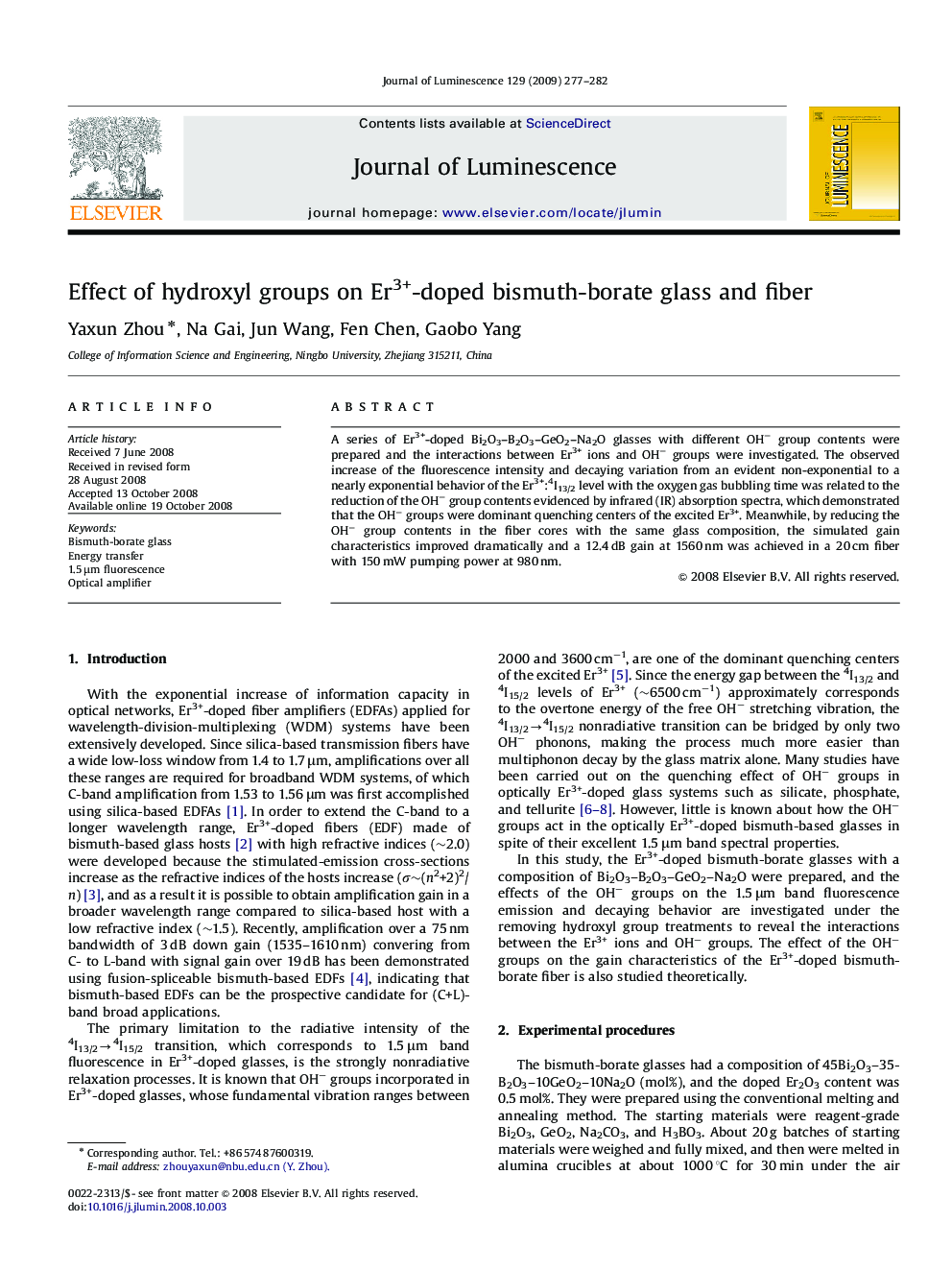 Effect of hydroxyl groups on Er3+-doped bismuth-borate glass and fiber