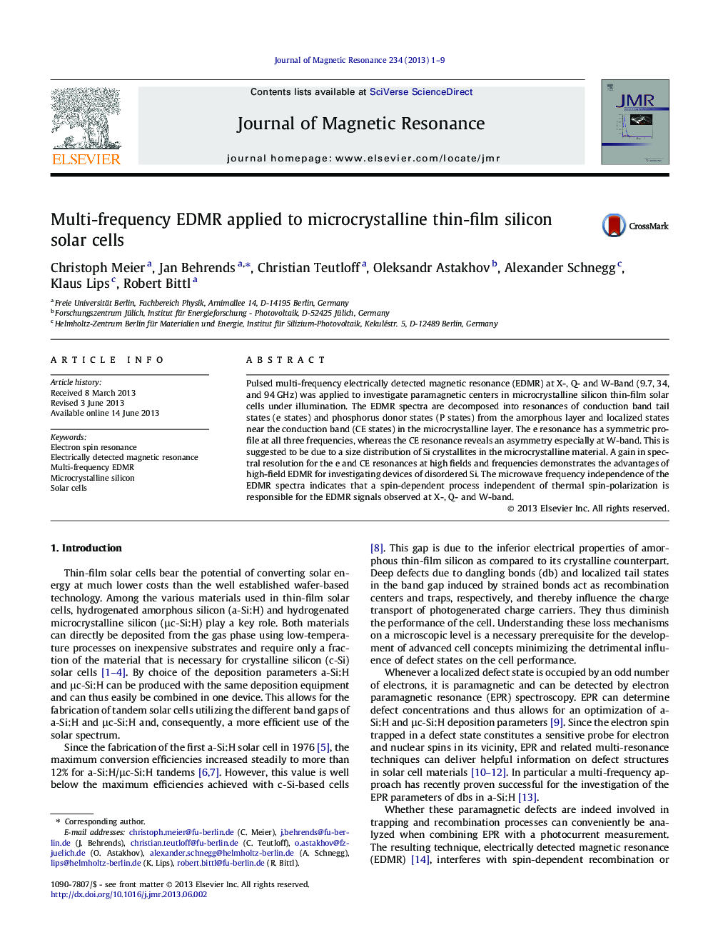 Multi-frequency EDMR applied to microcrystalline thin-film silicon solar cells