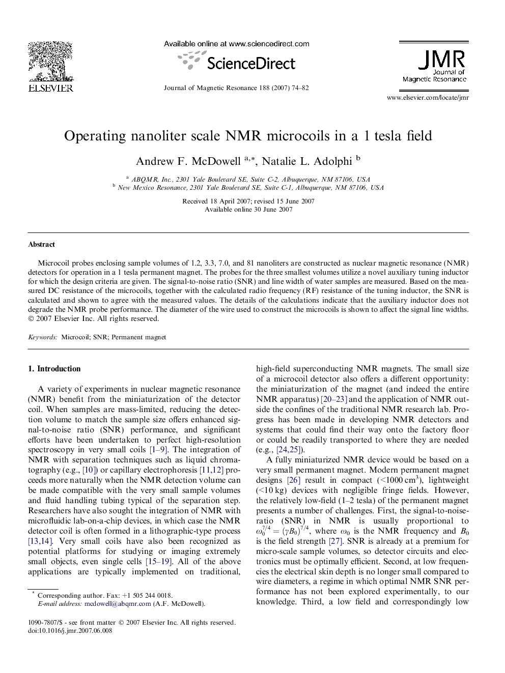 Operating nanoliter scale NMR microcoils in a 1Â tesla field