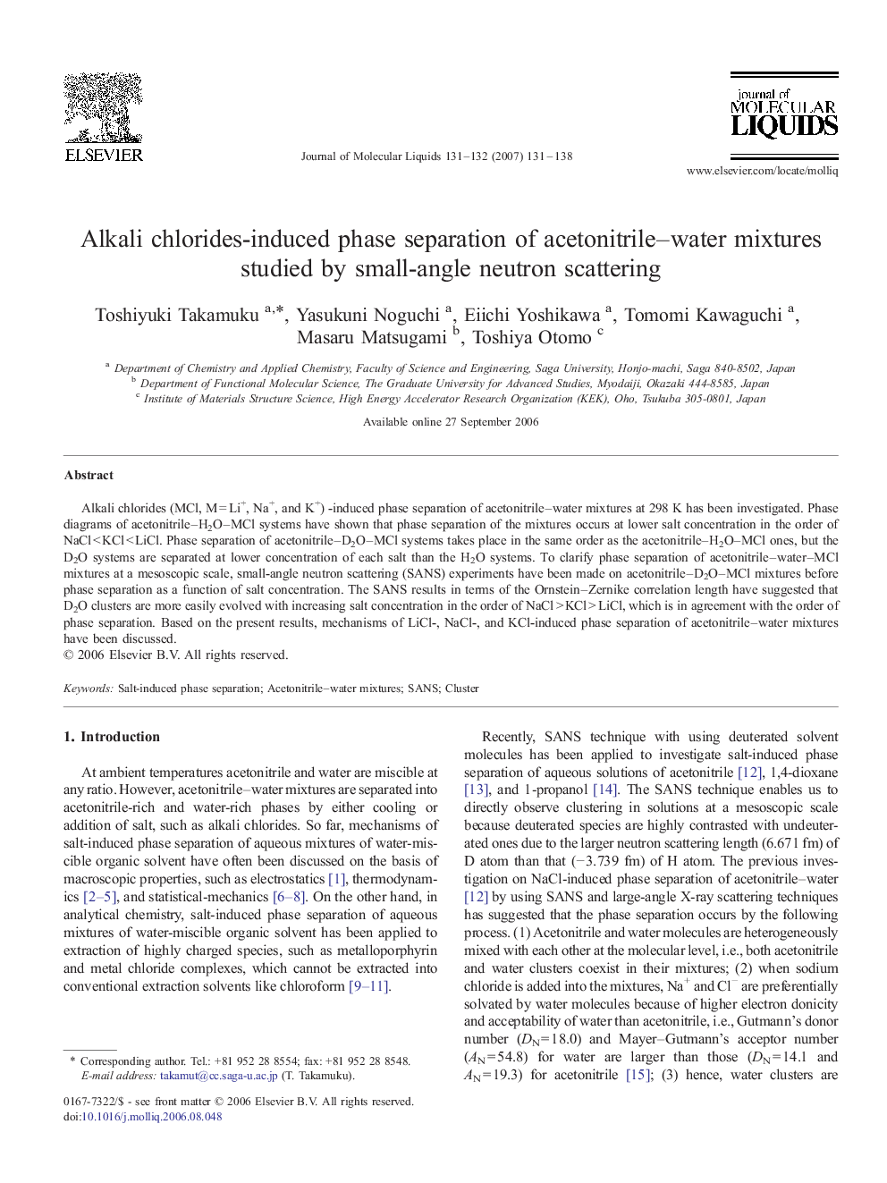 Alkali chlorides-induced phase separation of acetonitrile-water mixtures studied by small-angle neutron scattering