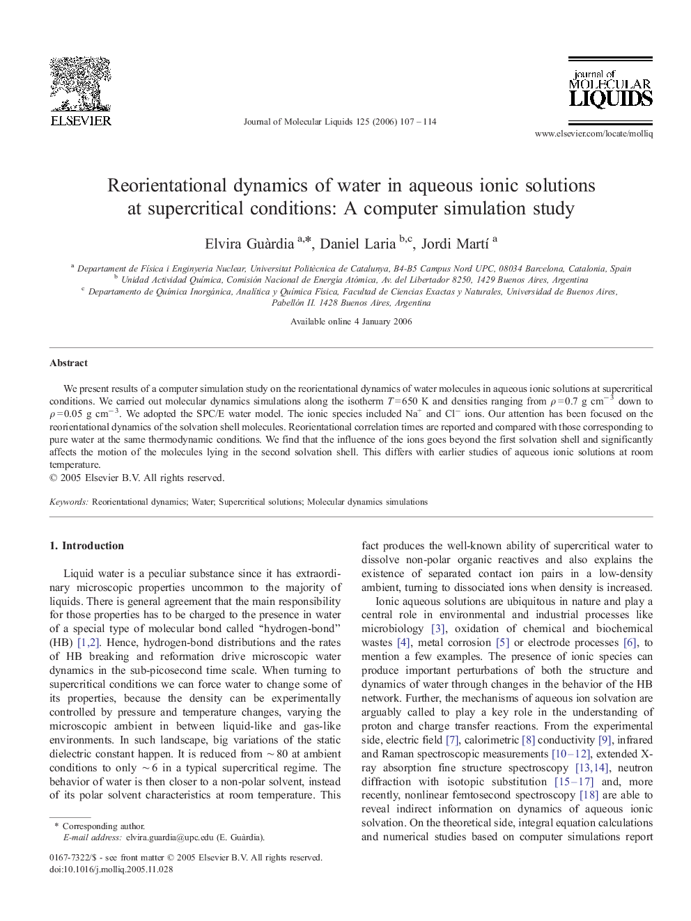 Reorientational dynamics of water in aqueous ionic solutions at supercritical conditions: A computer simulation study