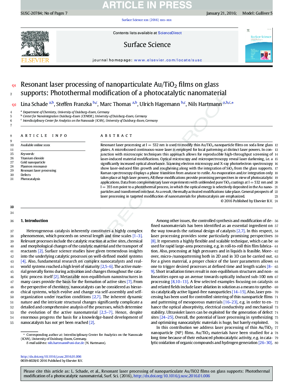 Resonant laser processing of nanoparticulate Au/TiO2 films on glass supports: Photothermal modification of a photocatalytic nanomaterial