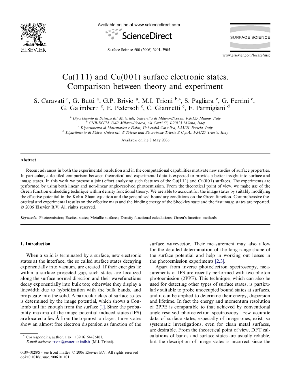 Cu(1 1 1) and Cu(0 0 1) surface electronic states. Comparison between theory and experiment