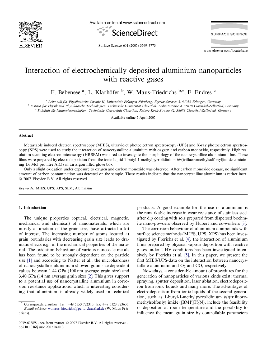 Interaction of electrochemically deposited aluminium nanoparticles with reactive gases