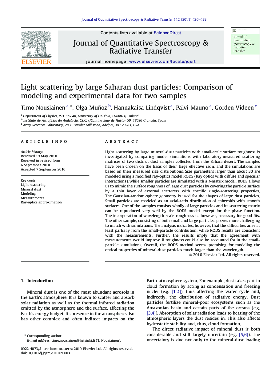 Light scattering by large Saharan dust particles: Comparison of modeling and experimental data for two samples