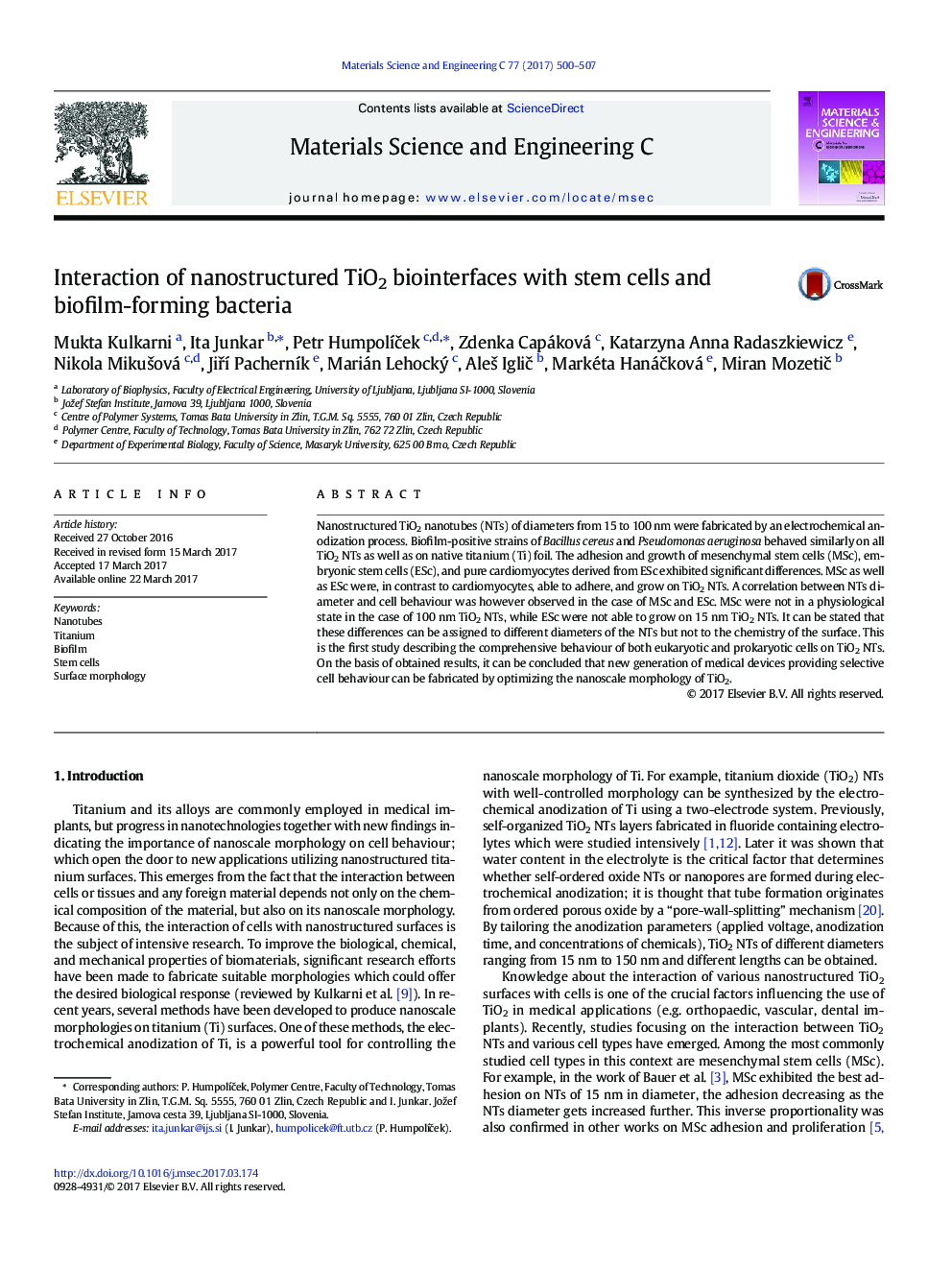 Interaction of nanostructured TiO2 biointerfaces with stem cells and biofilm-forming bacteria