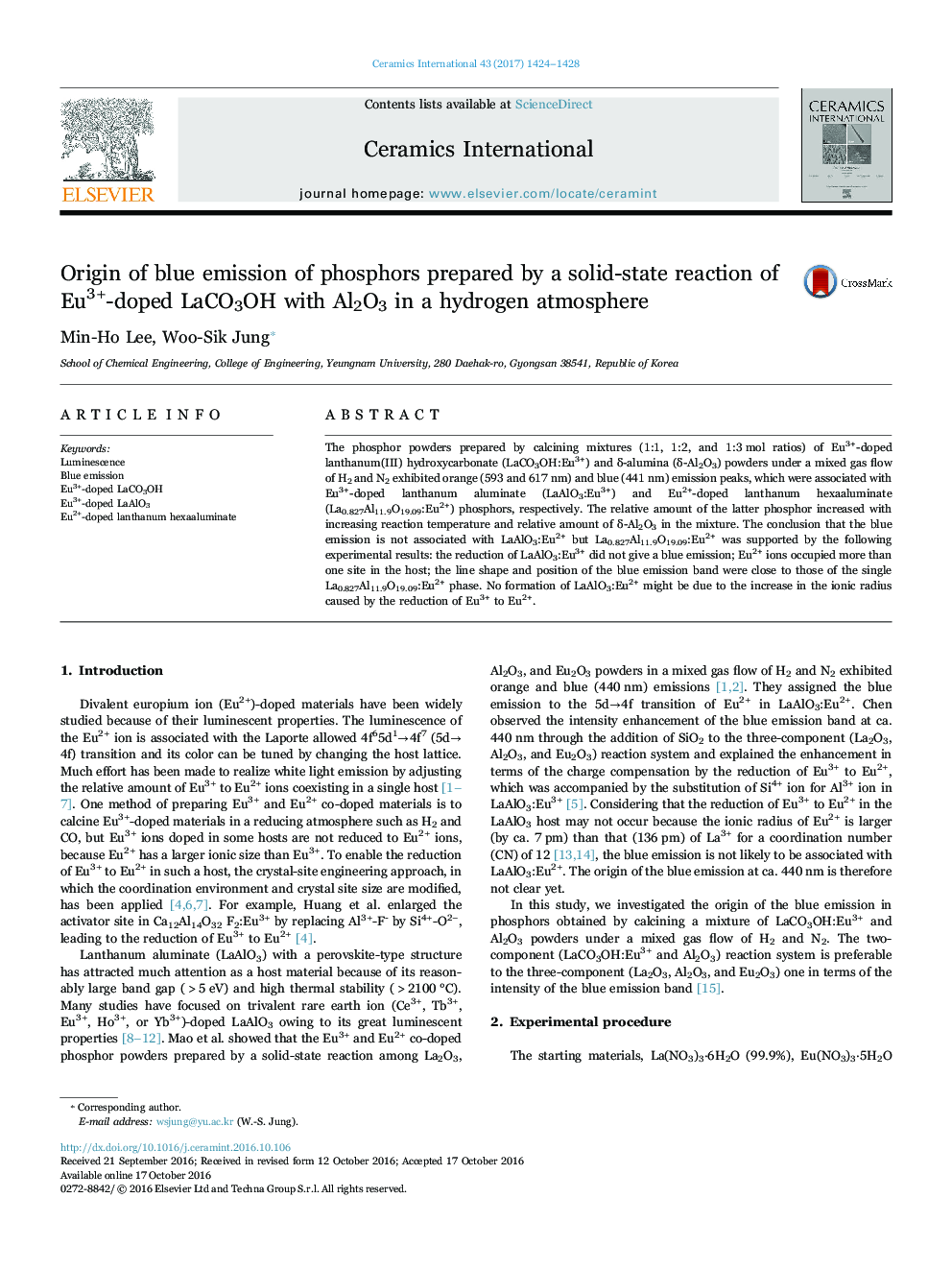 Origin of blue emission of phosphors prepared by a solid-state reaction of Eu3+-doped LaCO3OH with Al2O3 in a hydrogen atmosphere