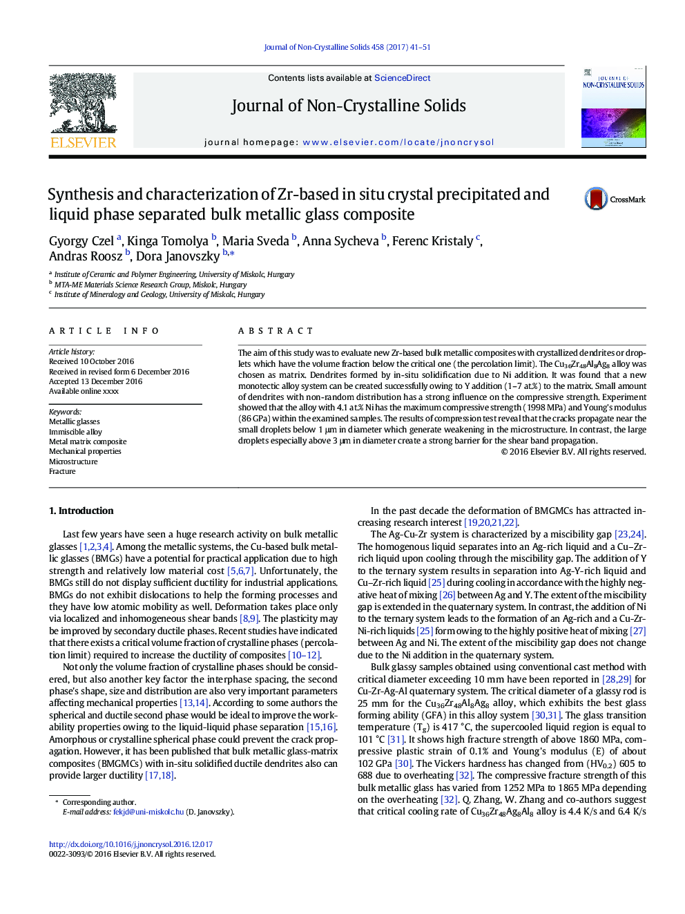 Synthesis and characterization of Zr-based in situ crystal precipitated and liquid phase separated bulk metallic glass composite