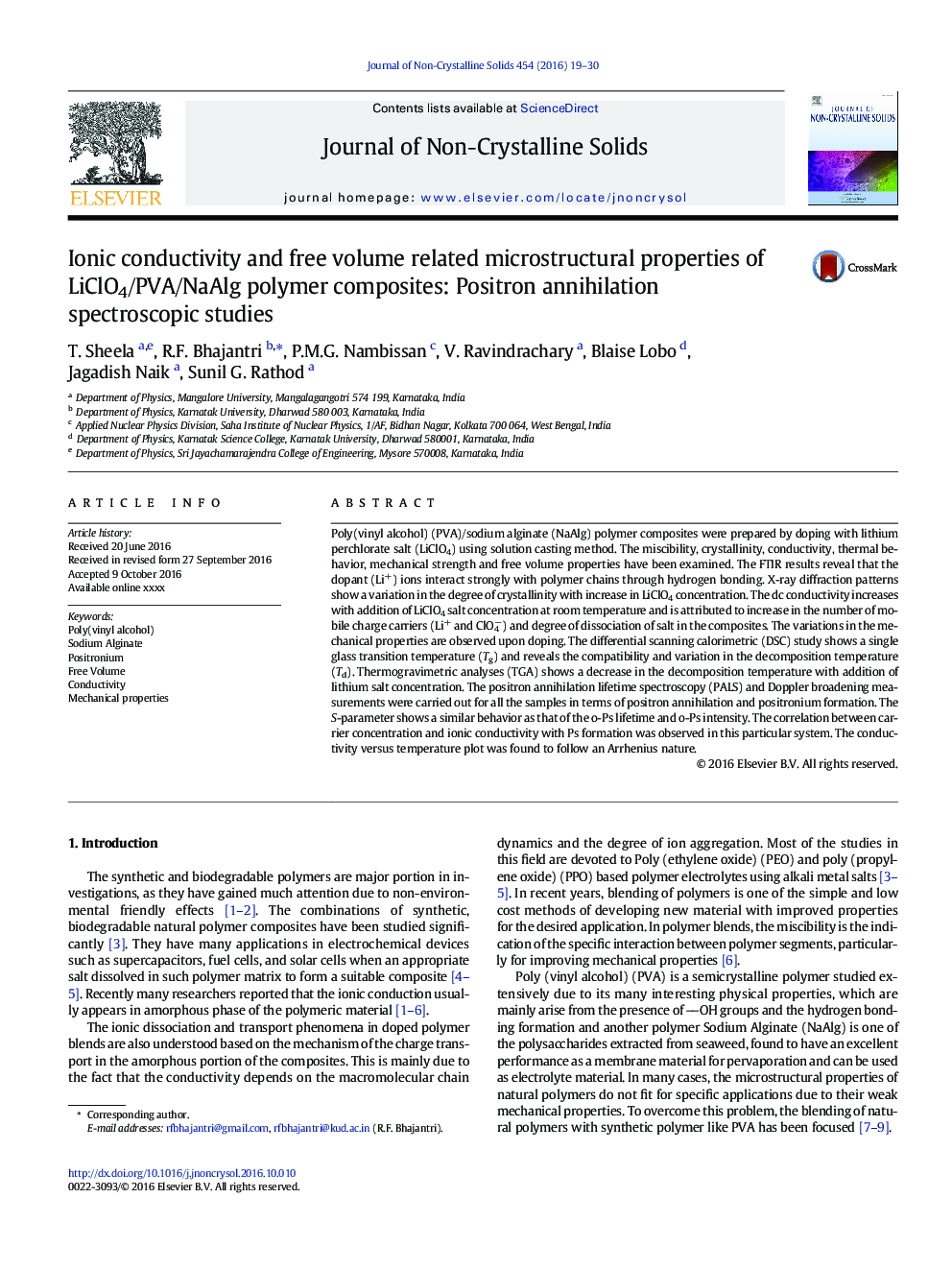 Ionic conductivity and free volume related microstructural properties of LiClO4/PVA/NaAlg polymer composites: Positron annihilation spectroscopic studies