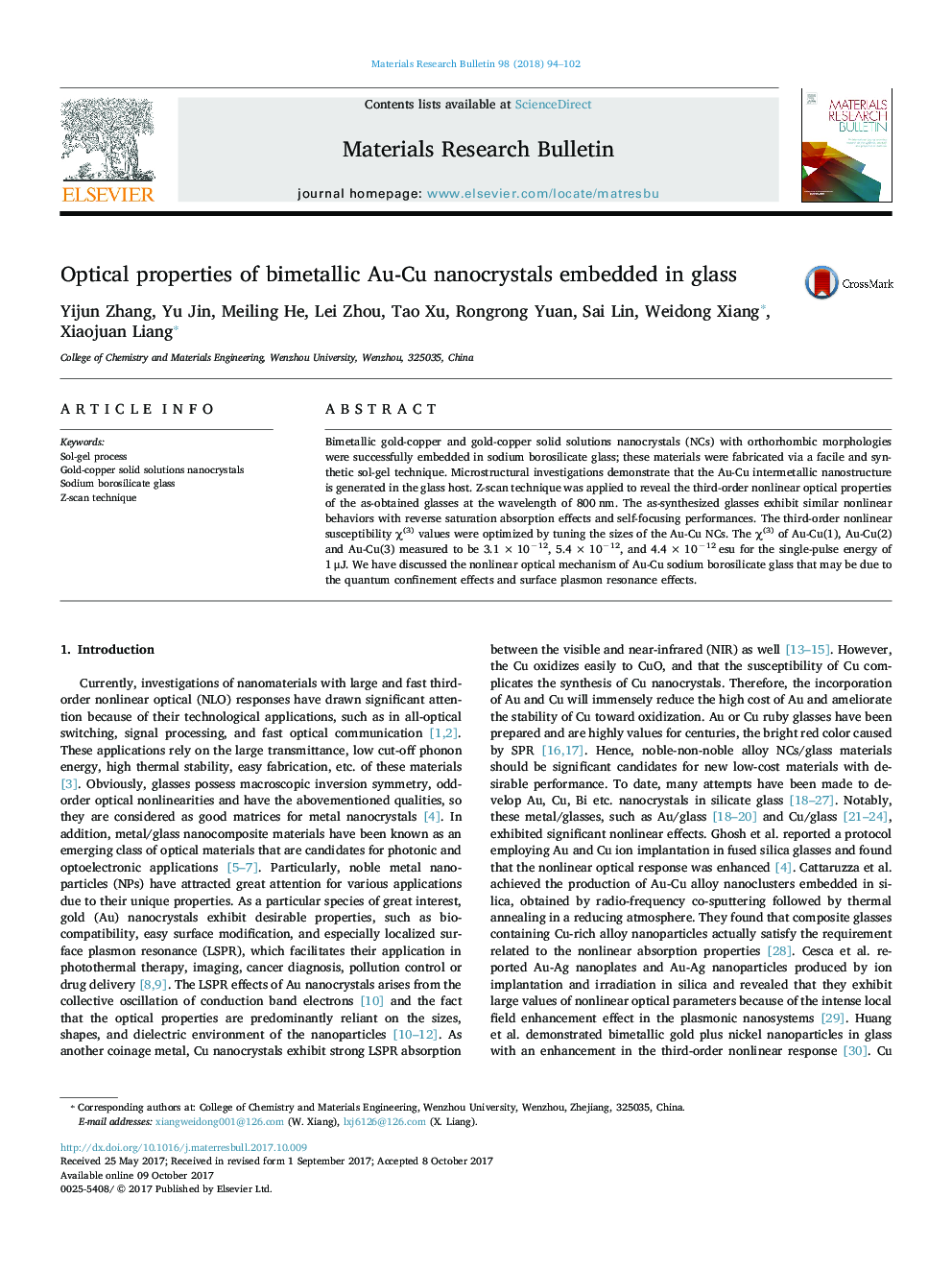 Optical properties of bimetallic Au-Cu nanocrystals embedded in glass