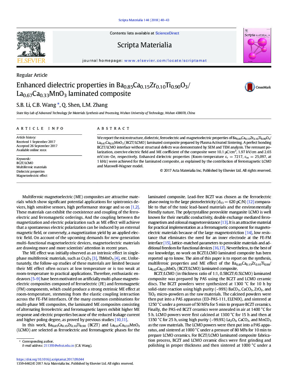 Enhanced dielectric properties in Ba0.85Ca0.15Zr0.10Ti0.90O3/La0.67Ca0.33MnO3 laminated composite