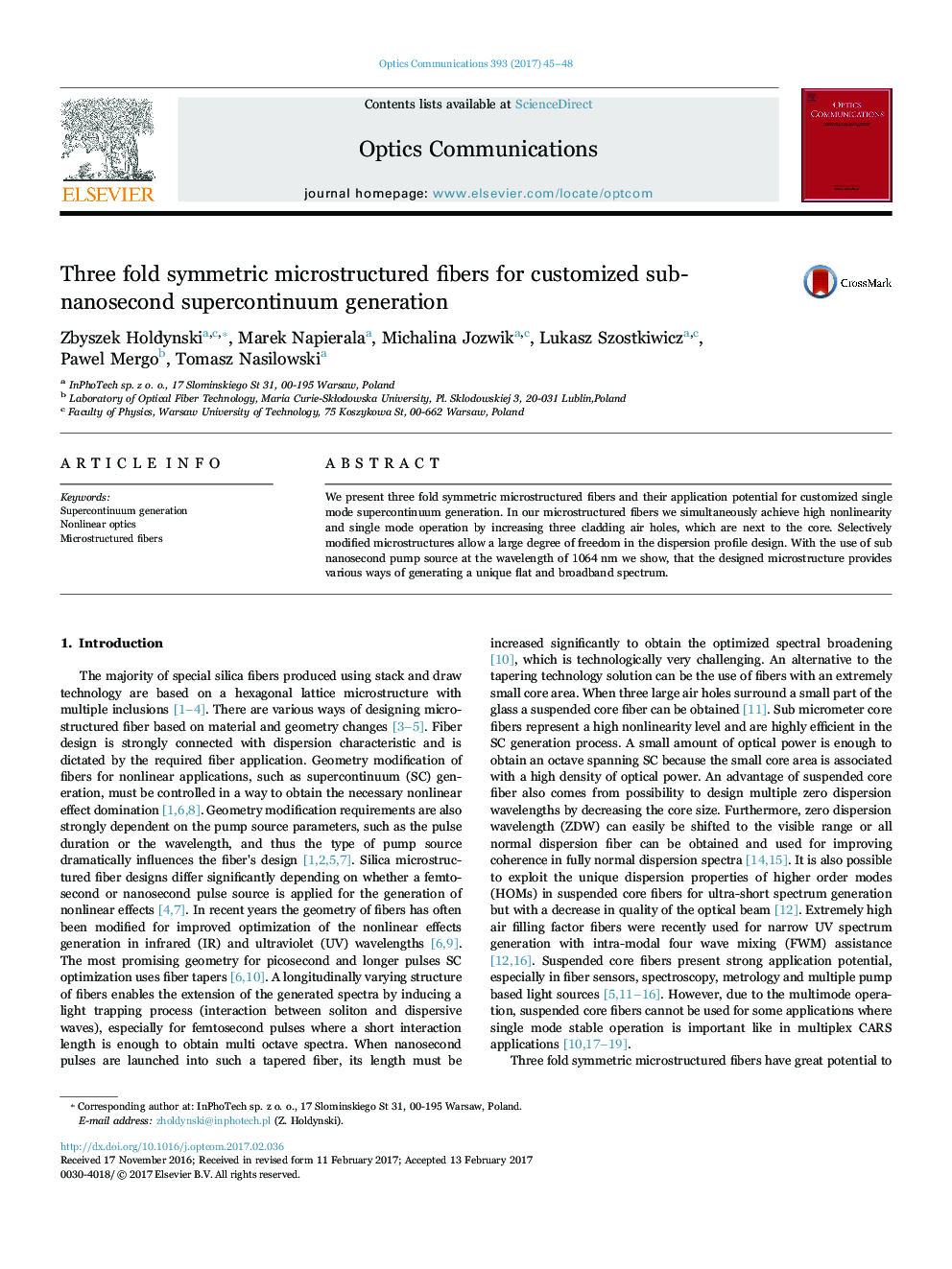 Three fold symmetric microstructured fibers for customized sub-nanosecond supercontinuum generation