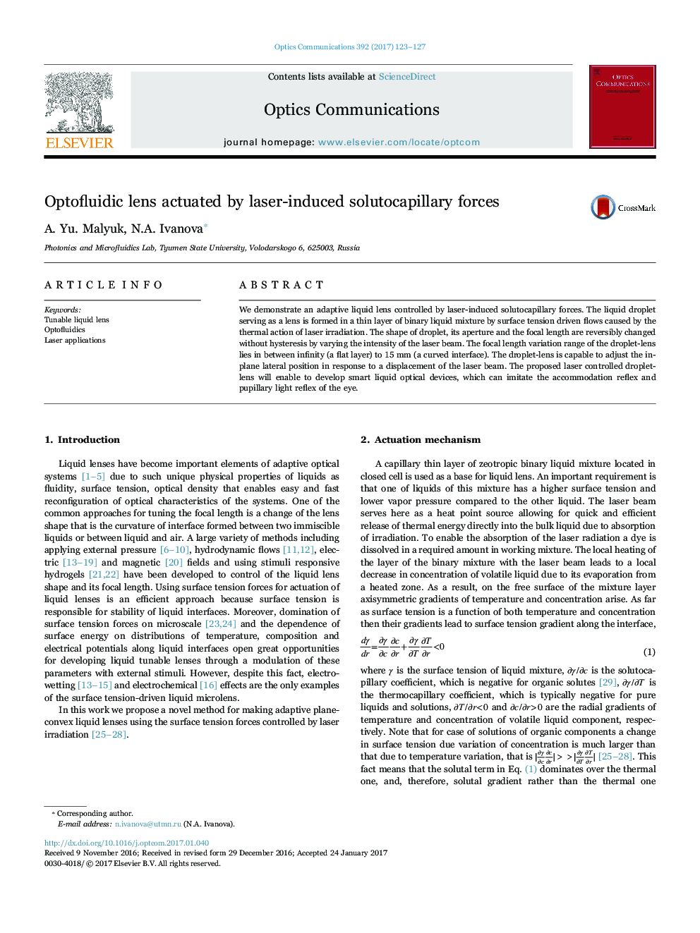 Optofluidic lens actuated by laser-induced solutocapillary forces