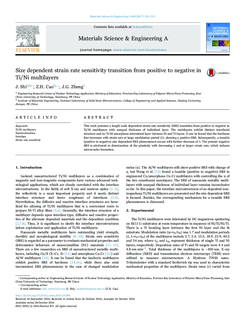 Size dependent strain rate sensitivity transition from positive to negative in Ti/Ni multilayers