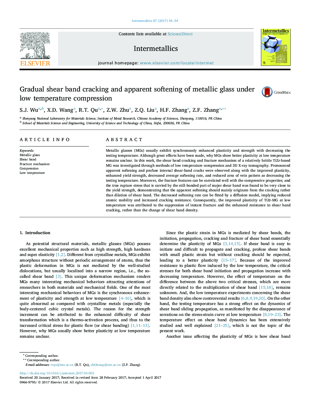 Gradual shear band cracking and apparent softening of metallic glass under low temperature compression