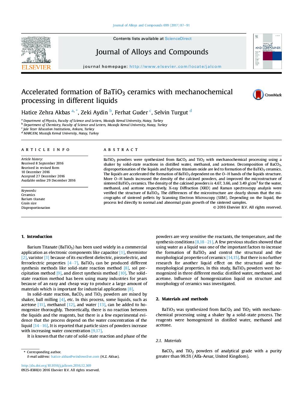 Accelerated formation of BaTiO3 ceramics with mechanochemical processing in different liquids