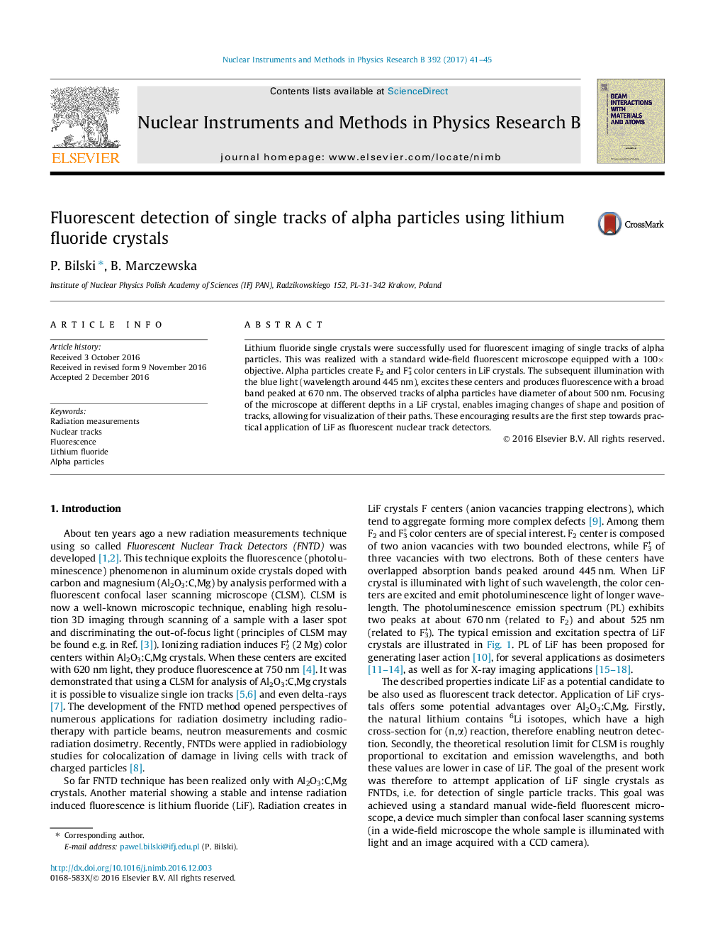 Fluorescent detection of single tracks of alpha particles using lithium fluoride crystals