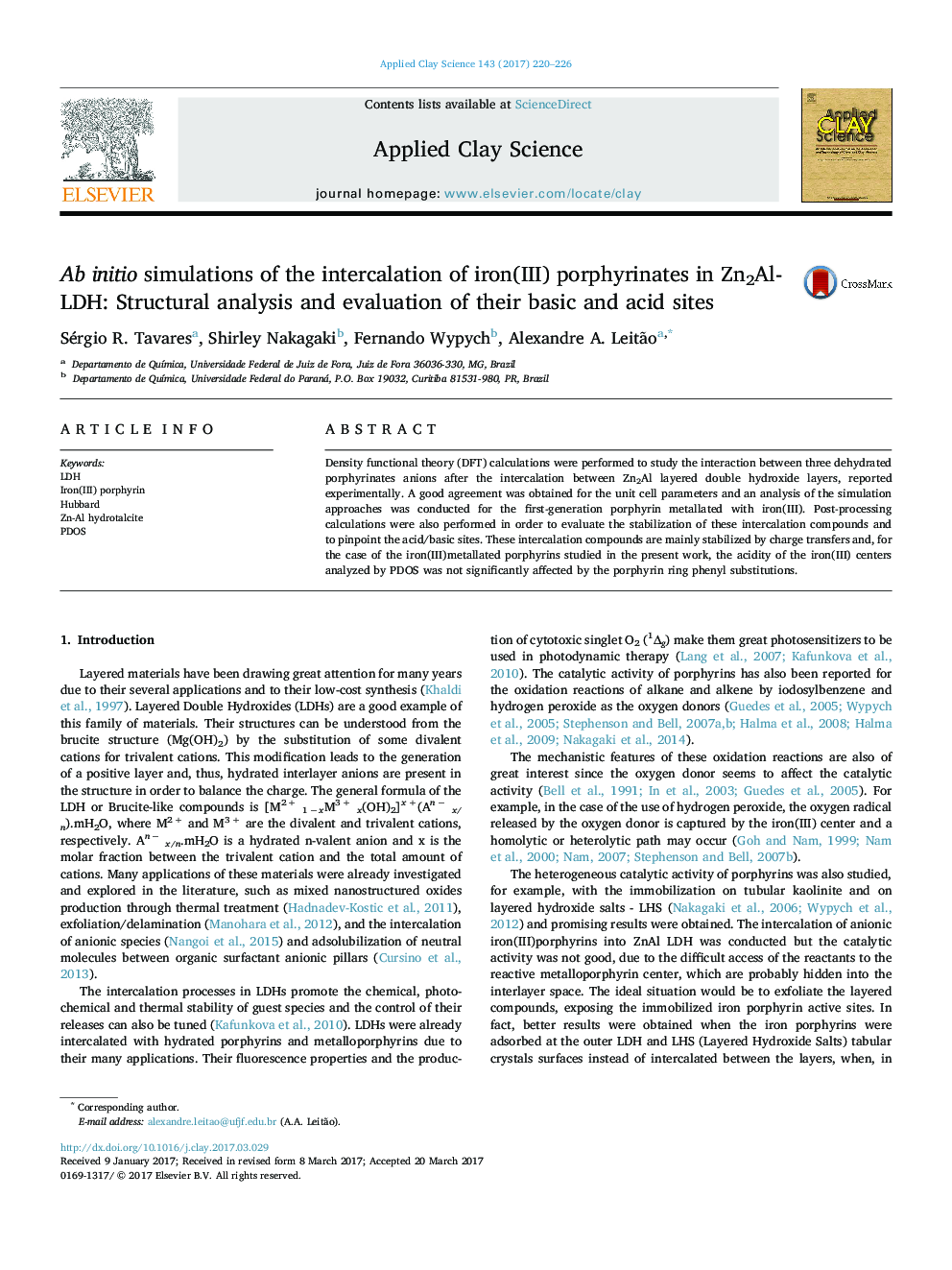 Ab initio simulations of the intercalation of iron(III) porphyrinates in Zn2Al-LDH: Structural analysis and evaluation of their basic and acid sites