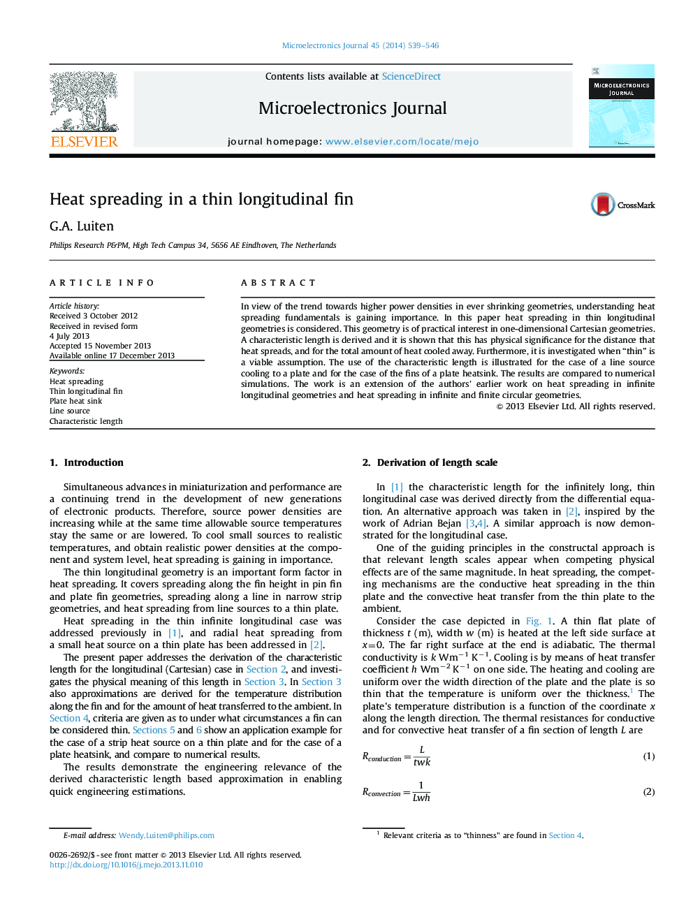 Heat spreading in a thin longitudinal fin